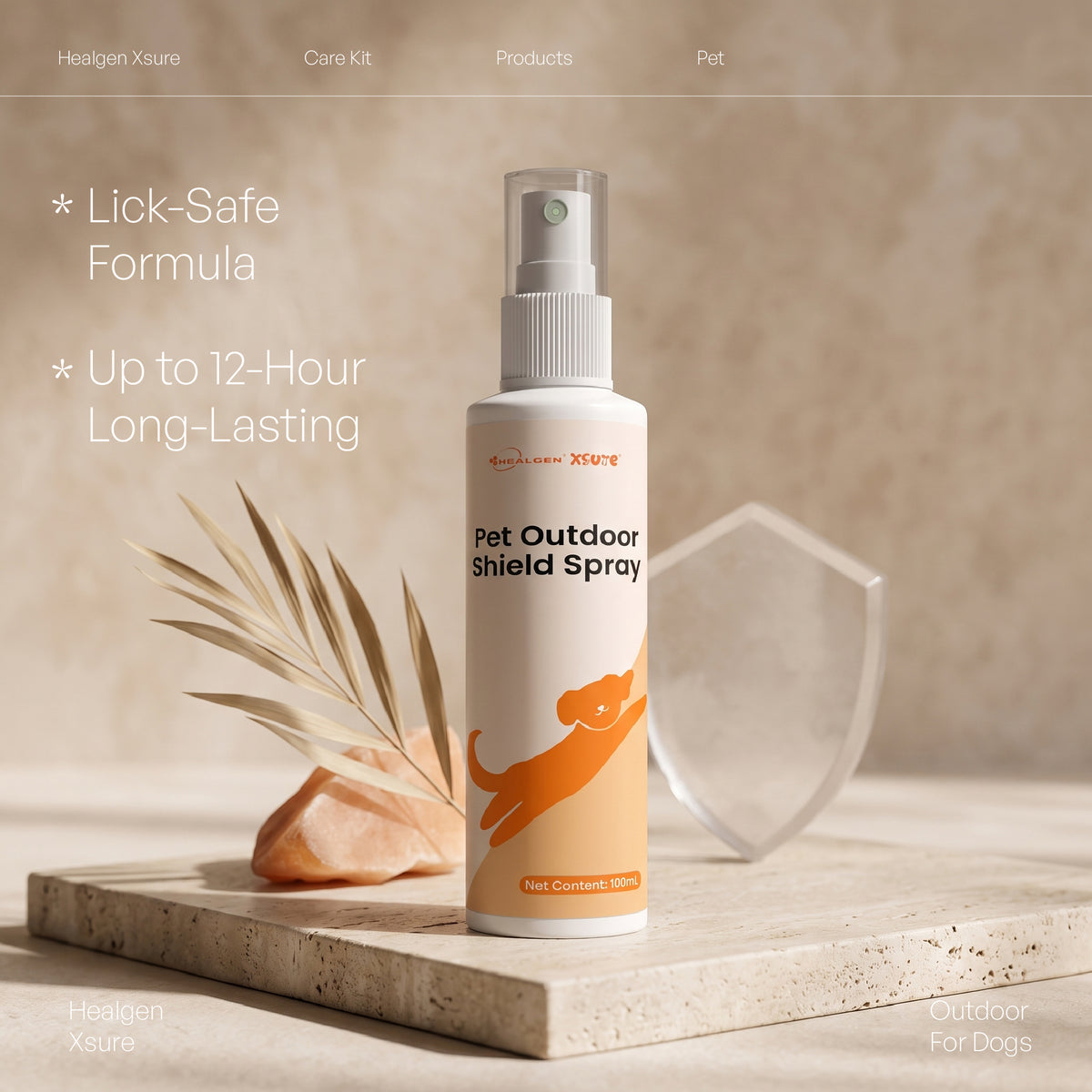 A bottle of pet outdoor shield spray stands on a stone slab in a warm beige setting, with dried leaves and a clear shield-shaped prop behind it. The bottle is white with orange text and a large orange dog silhouette.